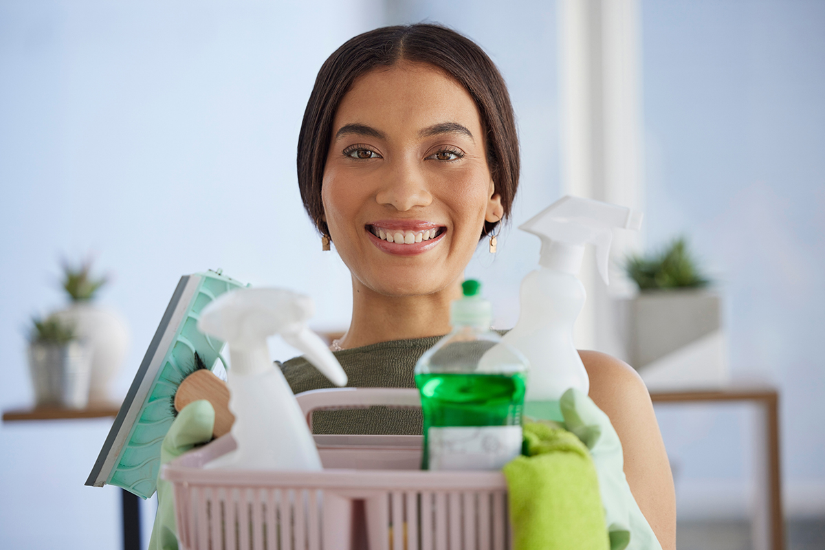 Cleaning supplies, happy portrait and woman, housekeeping, cleaning service and maintenance in home.